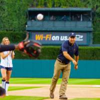 Man throwing pitch next to Detroit Tigers mascot pt. 4